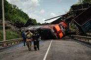 Russia Says Ukraine Behind Rail Bridge Blasts that Killed 7