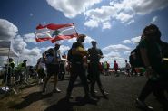 At Open-Air Church Celebration, Many Thousands of Young Catholics Eagerly Await Pope