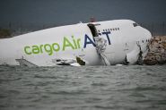 Cargo Plane Skids off Hong Kong Runway, Kills Two