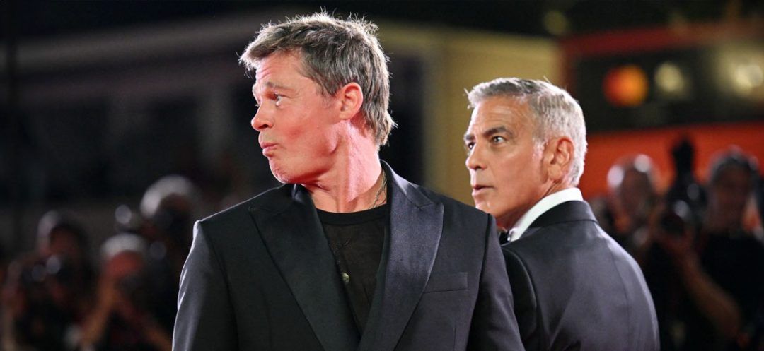 George Clooney and Brad Pitt Dazzle Venice with “Wolfs”