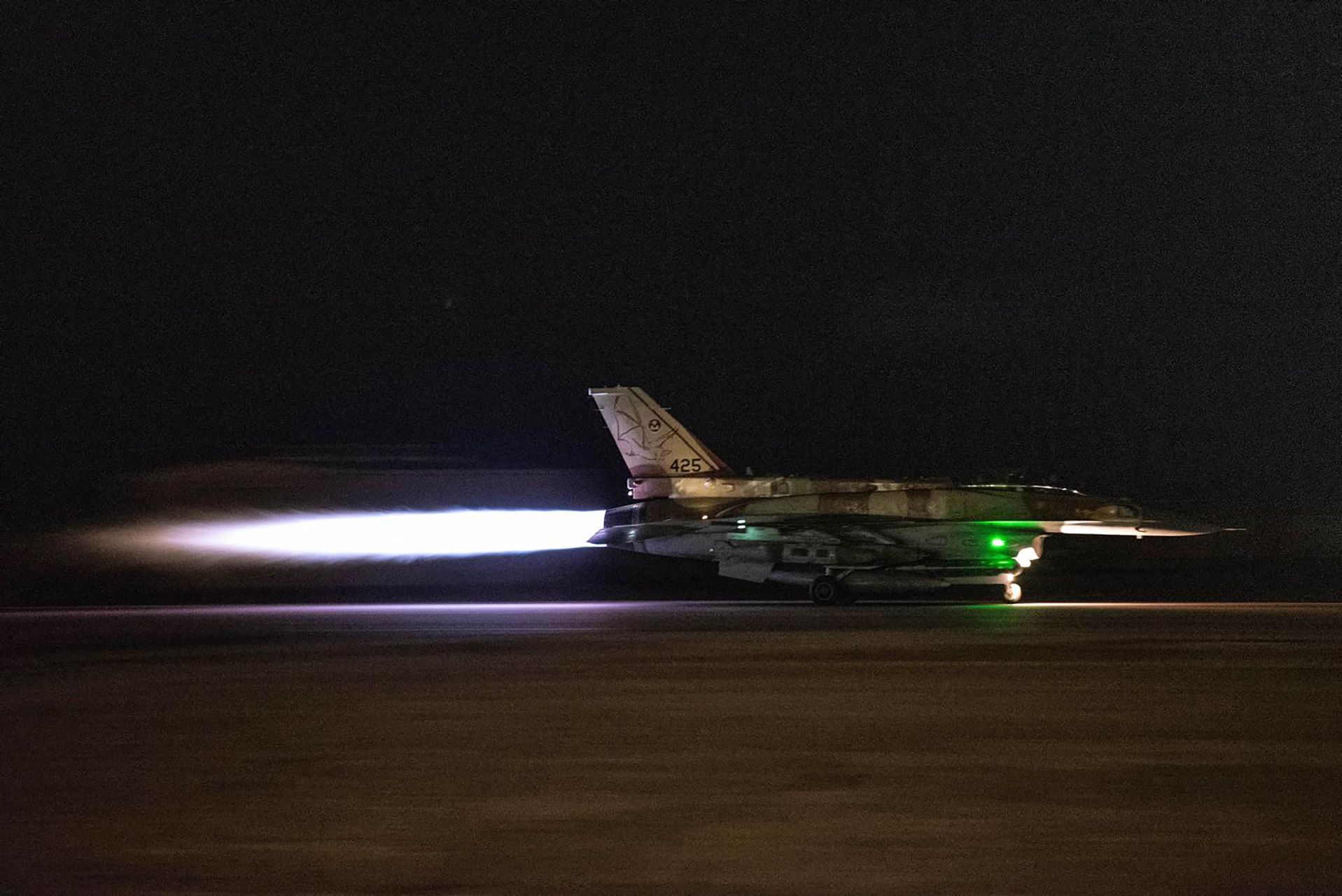 Israel Strikes Key Iranian Naval Facility as U.S. Considers Troop Buildup in Middle East