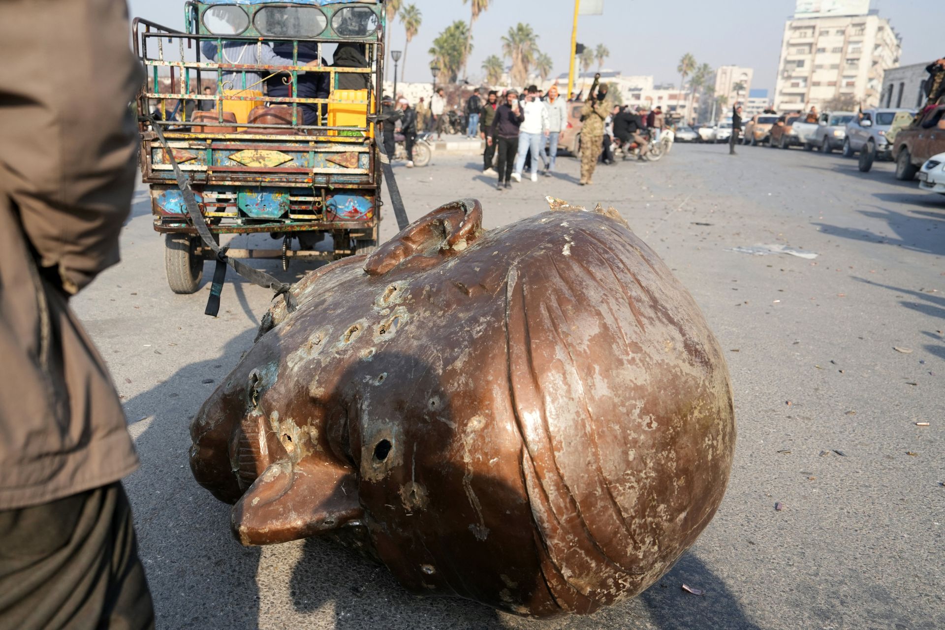 Statue of Former Syrian President Toppled in Hama Amid Cheering Crowd