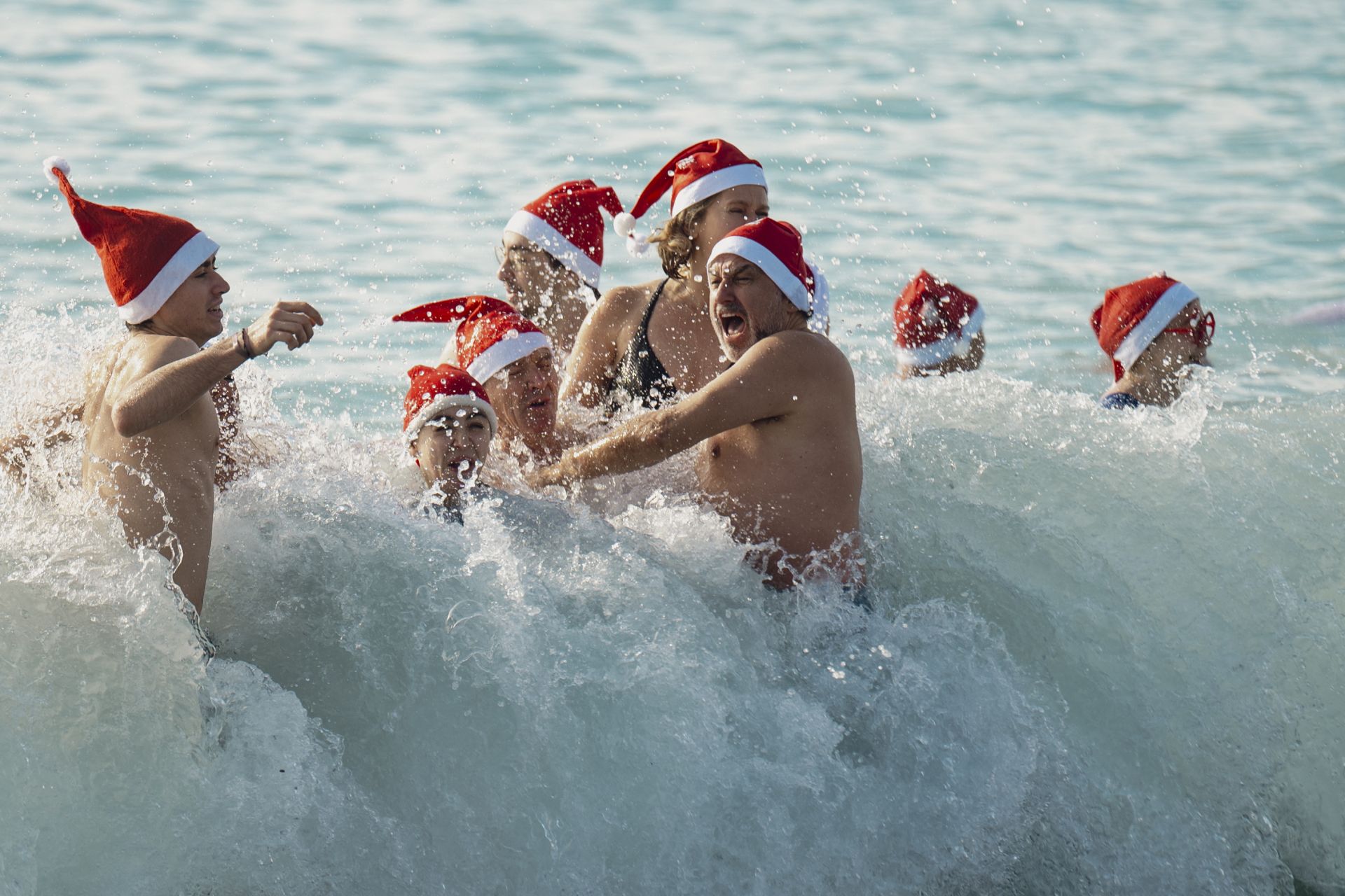 Festive Spirit on the French Riviera: Santa Claus and Mrs. Claus Join Traditional Christmas Bath in Nice