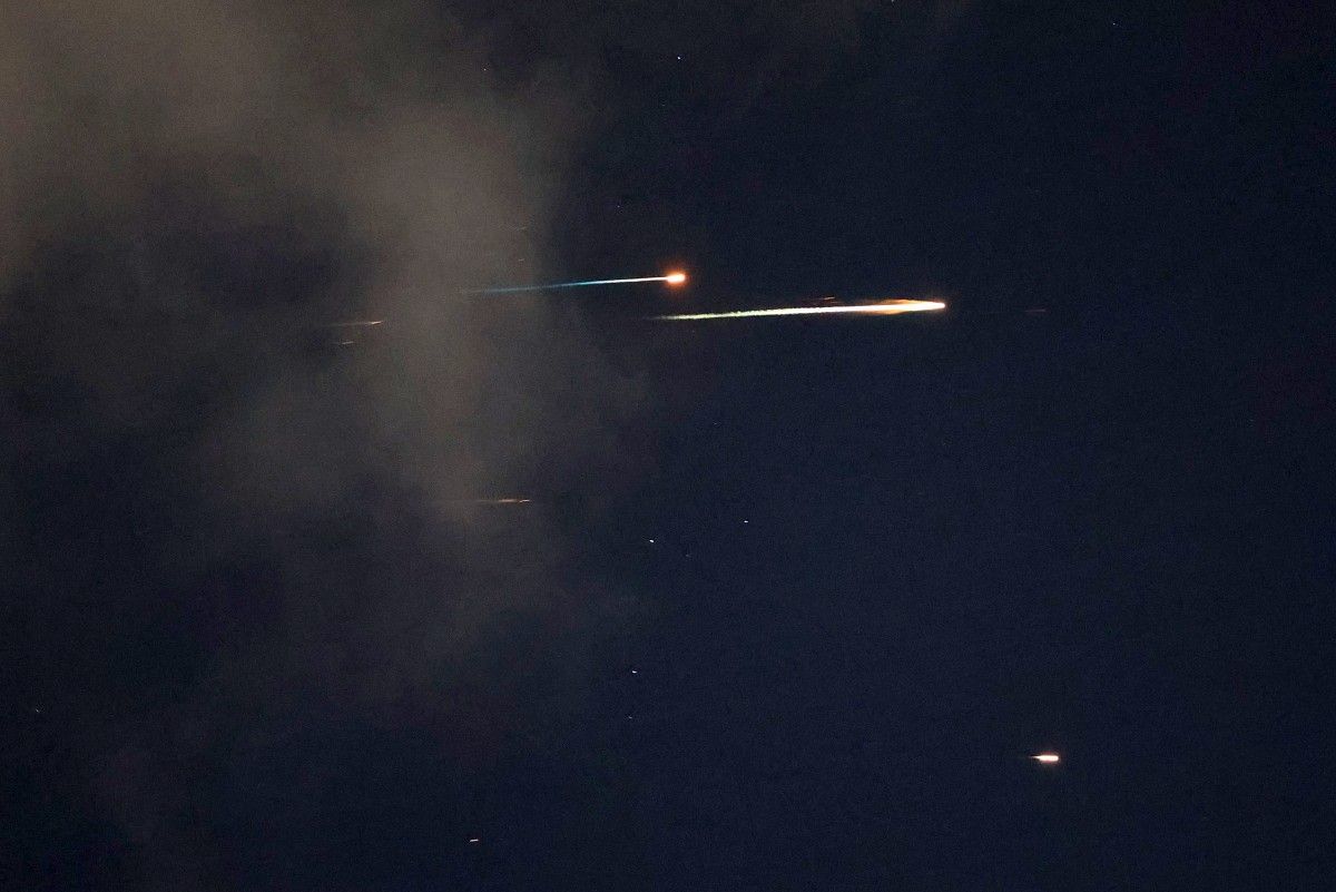 Israeli Airstrikes Hit Central Iran: Deaths Reported in Qom, Explosions in Isfahan