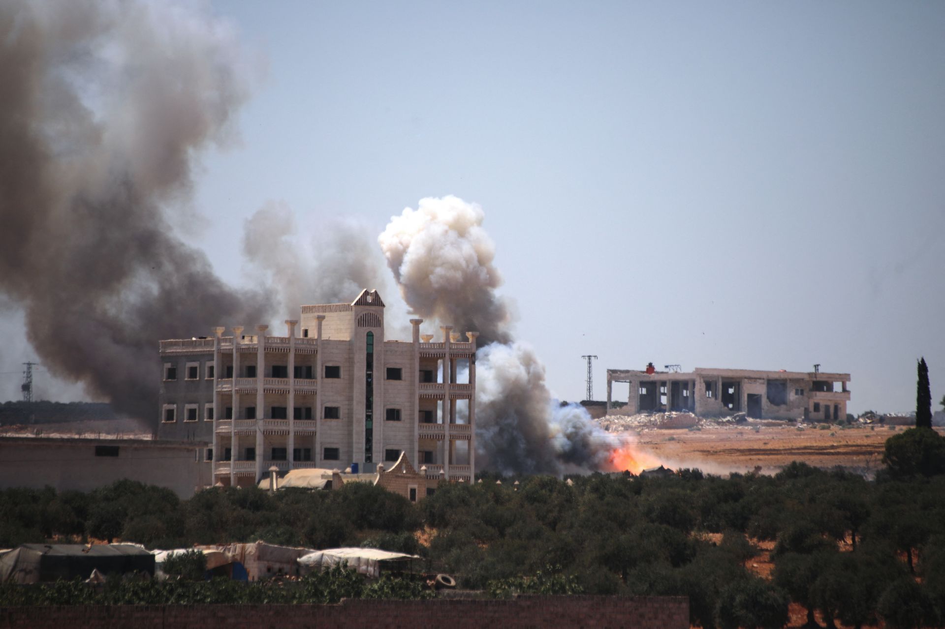At Least 12 Dead, Over 100 Injured in Explosions at Weapons Depot in Northwestern Syria
