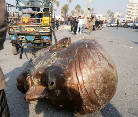 Statue of Former Syrian President Toppled in Hama Amid Cheering Crowd