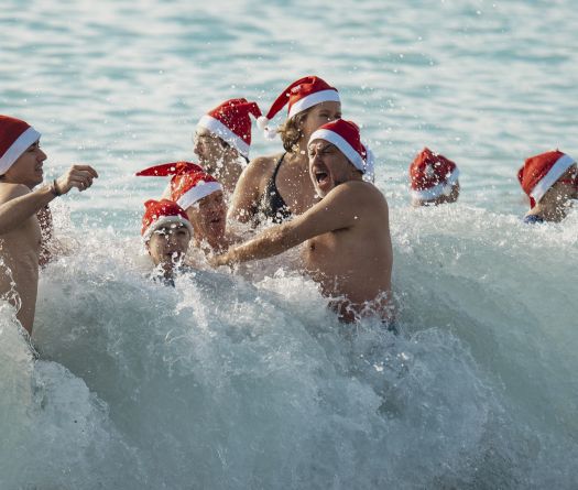 Festive Spirit on the French Riviera: Santa Claus and Mrs. Claus Join Traditional Christmas Bath in Nice