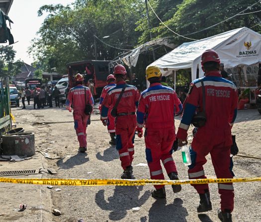 Two Pulled from Indonesia School Collapse as Rescuers Race against Time