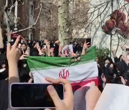 Iran University Suspends Three Students for Burning Flag