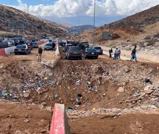 Taxis Stuck Between Bomb Craters on Lebanon-Syria Border