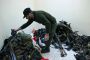 Syrian Soldiers Hand in Weapons, Hope for Quiet Lives