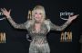 Dolly Parton, Country Singer, Reassures Fans with “I Ain’t Dead Yet” Message
