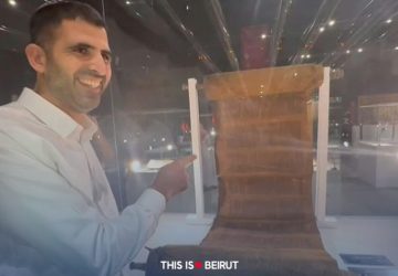 Israel's communications minister inspects ancient Torah during Saudi visit